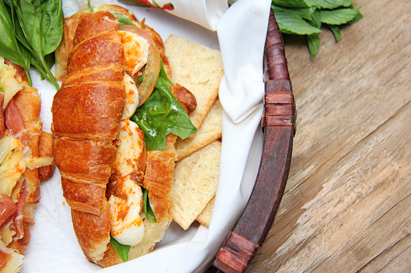 Parma ham, Fresh Basil and Buffalo Mozzarella Croissant Sandwiches with a Hot Pesto Mayonnaise Spread.