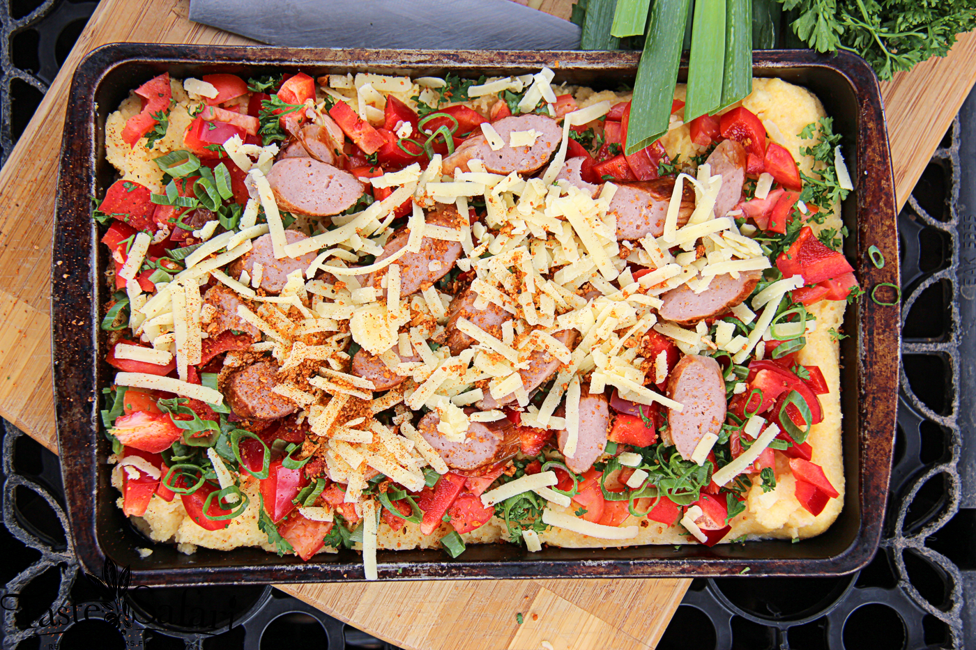 Cornmeal, Smoke Sausage, Herbs and Cherry Tomato Brunch Bake